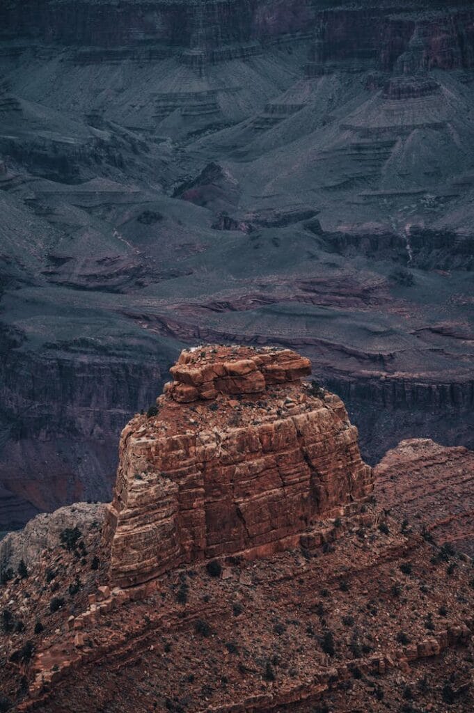 Home 5 Capture the breathtaking aerial perspective of the Grand Canyon's majestic rock formations.